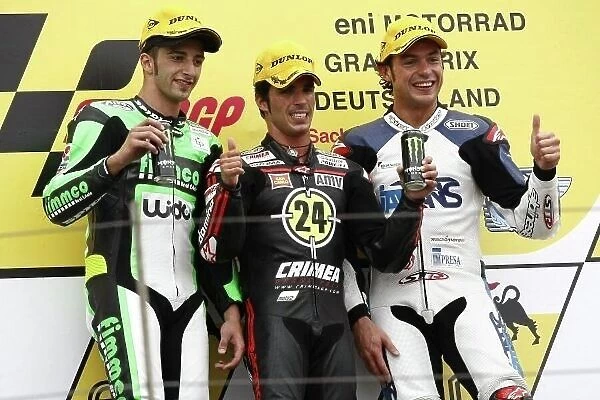MotoGP. Moto2 podium and results:. 1st Toni Elias (ESP), Moriwaki, centre.
