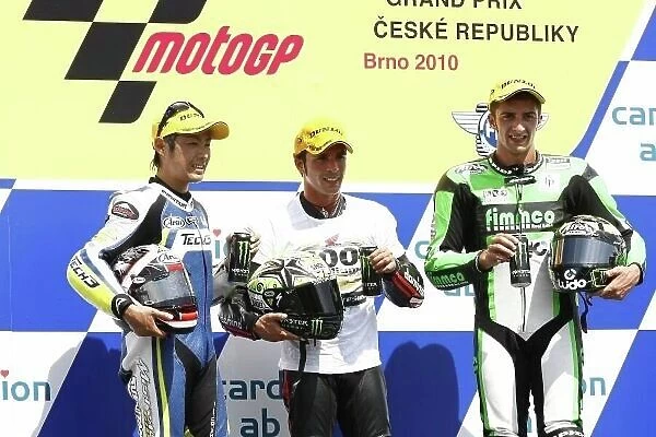 MotoGP. Moto2 podium and results:. 1st Toni Elias (ESP), Moriwaki, centre.