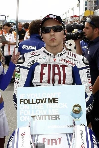 MotoGP. Jorge Lorenzo (ESP), FIAT Yamaha, with a message to follow him on Twitter.