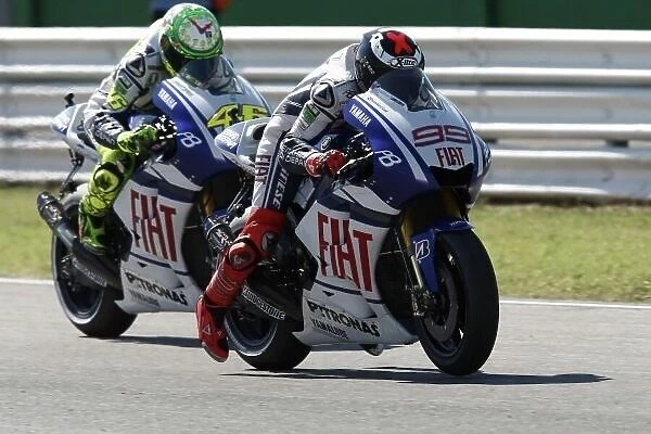 MotoGP. R-L: Jorge Lorenzo (ESP) and FIAT Yamaha team mate Valentino Rossi (ITA).