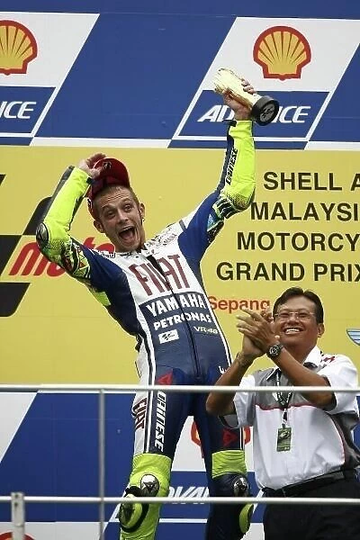 MotoGP. Race winner Valentino Rossi (ITA) celebrates on the podium.