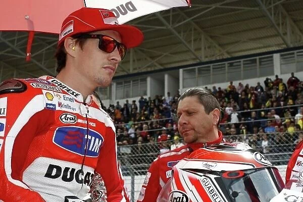 MotoGP. Nicky Hayden (USA), Ducati Team, left.