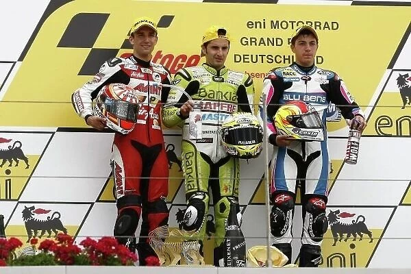 MotoGP. 125cc podium and results:. 1st Hector Faubel 