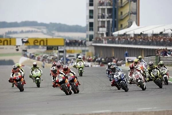 MotoGP. Dani Pedrosa (ESP), Repsol Honda Team, leads at the start of the race