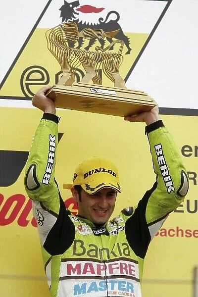 MotoGP. 125cc race winner Hector Faubel (ESP), Bankia Aspar Team 125cc.