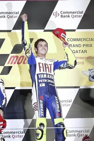 MotoGP. Race winner Valentino Rossi (ITA), FIAT Yamaha Team, on the podium.