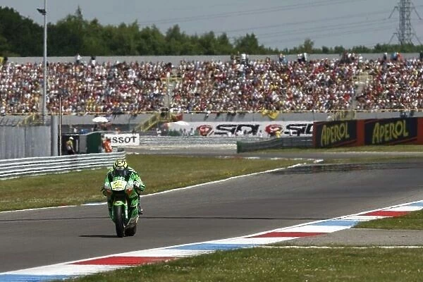 MotoGP. Andrea Iannone (ITA) Fimmco Speed Up leads the Moto2 race.