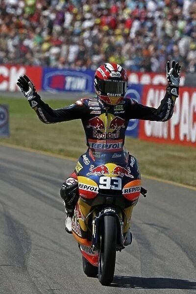MotoGP. Marc Marquez (ESP), Derbi, celebrates victory.