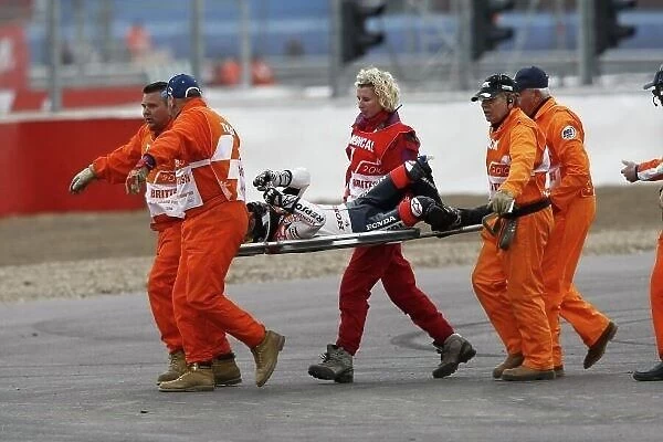MotoGP. Dani Pedrosa (ESP), Repsol Honda, is stretchered into an ambulance