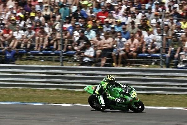 MotoGP. Andrea Iannone (ITA) Fimmco Speed Up leads the Moto2 race.