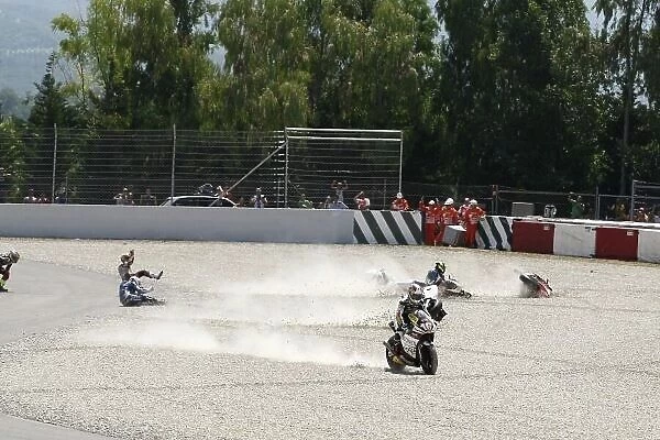 MotoGP. Carnage at the start of the Moto2 race.