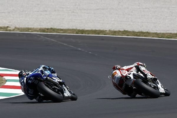 MotoGP: Ben Spies Yamaha Factory Racing, leads Marco Simoncelli, San Gresini Honda Gresini