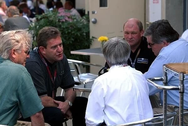 Nigel Northridge (GBR left) CEO Gallaher Group PLC talks too Bernie Ecclestone (GBR) and David Marren (GBR) F1 Sponsorship director for Benson & Hedges
