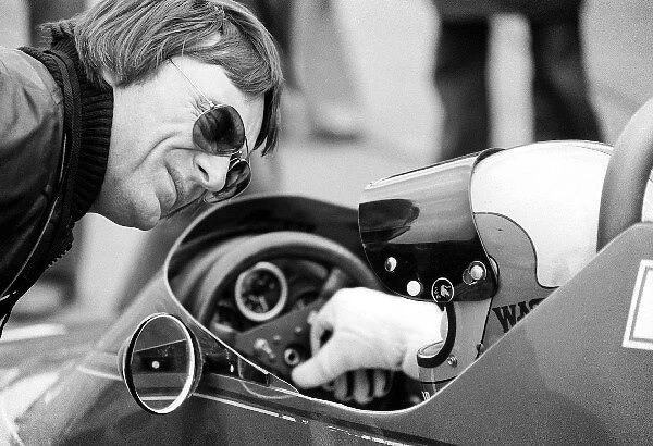 Non-Championship Formula One: Bernie Ecclestone Brabham Team Owner talks with John Watson Brabham BT45, who took pole position and finished