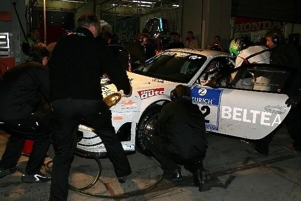 Nurburgring 24 Hours: Richard Westbrook HISAQ Competition Porsche 997 GT3-RSR make a pit stop