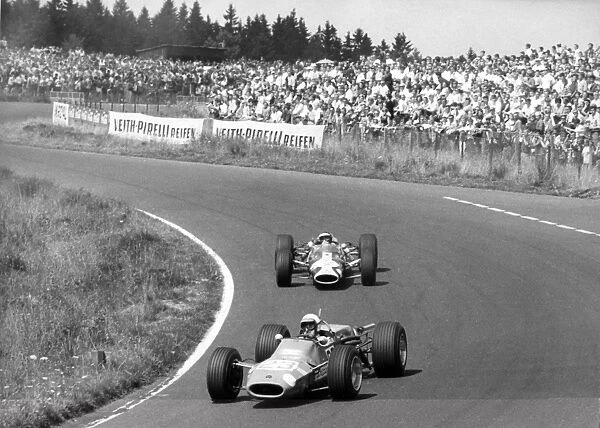 Nurburgring, Germany. 6 August 1967: Jo Schlesser, Matra MS5-Cosworth, F2 class, leads Jackie Oliver, Lotus 48-Cosworth, F2 class, action