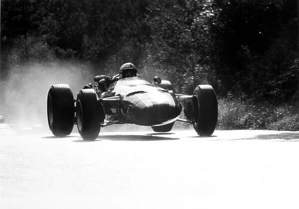 Nurburgring, Germany. 7 August 1966: John Surtees, Cooper T81-Maserati, 2nd position, action, jump