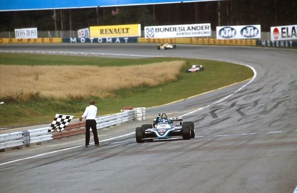 Osterreichring, Zeltweg, Austria: Jacques Laffite takes the chequered flag for 1st position