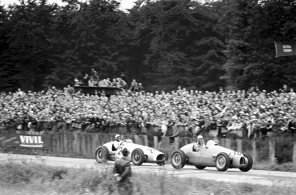Paul Frere, Retired-wheel, leads Robert Manzon: 1954 German Grand Prix, Nurburgring