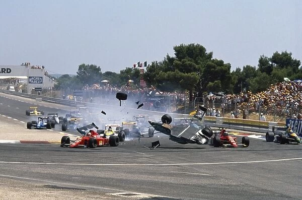Paul Ricard, Le Castellet, France. 7-9 July 1989: Mauricio Gugelmin has a huge crash at Epingle Ecole at the start of the race. Nigel Mansell