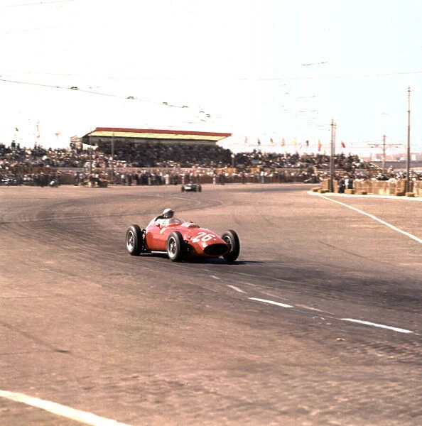 Phil Hill, Ferrari Dino 246 Portuguese Grand Prix, 1960 Photo: LAT Ref: 3 / 0189