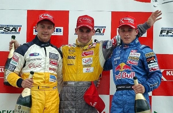 The podium (L to R): Fabio Carbone (BRA) Signature Dallara-Sodemo, second; Timo Glock