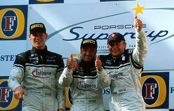 Porsche Supercup: An Infineon Team Farnbacher 1, 2, 3 on the podium: Jorg Bergmeister second; Marco Werner winner; Philip Peter third