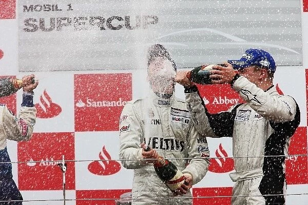 Porsche Supercup: James Sutton celebrates his third position on the podium with race winner Rene Rast Veltins MRS Racing