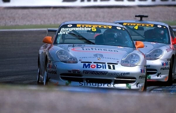 Porsche Supercup: Third place finisher Jorg Bergmeister and fourth place finisher Marco Werner battle for position
