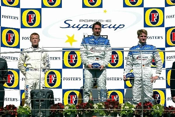 Porsche Supercup: The podium finishers: Patrick Long Porsche AG, Wolf Henzler Team Farnbacher and Dirk Werner Team Farnbacher