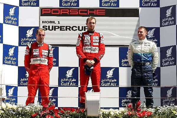 Porsche Supercup: The podium: Jeroen Bleekemolen, second; Rene Rast, race winner; NickTandy third