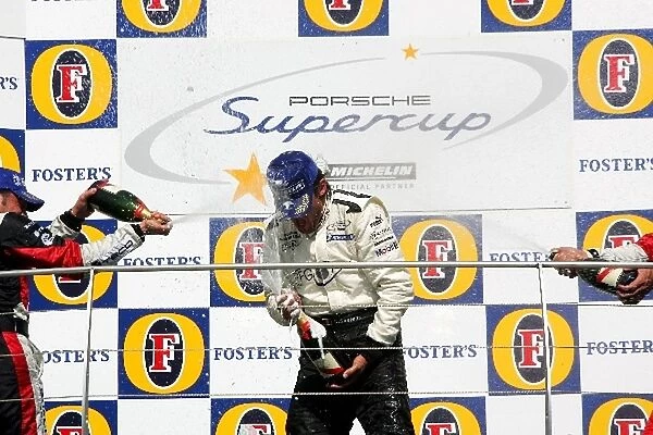 Porsche Supercup: Race winner David Salens celebrates on the podium