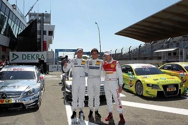 DTM. The top three after qualifying - (l-r), Jamie Green 