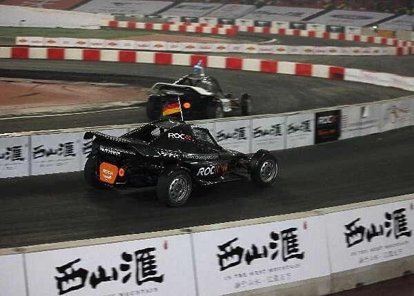 Race of Champions: David Coulthard and Sebastian Vettel go head to head in the ROC Buggies