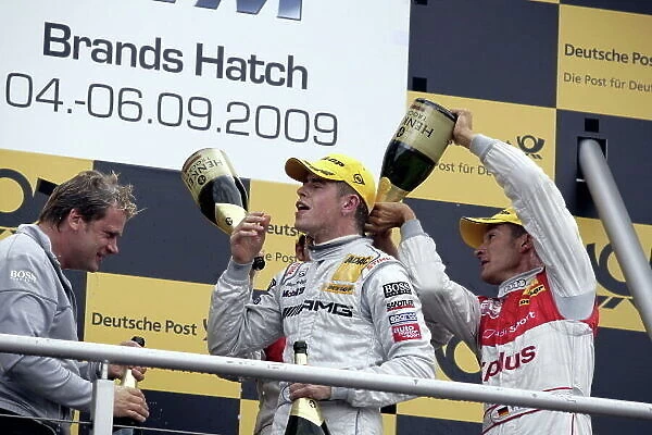 DTM. Race winner Paul Di Resta (GBR) AMG Mercedes C-Klasse (2009), centre, on the podium.