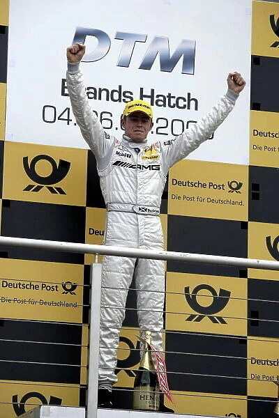 DTM. Race winner Paul Di Resta (GBR) AMG Mercedes C-Klasse (2009), centre, on the podium.