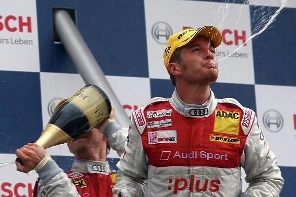 DTM. Race winner Timo Scheider (GER) Team Abt Audi A4 DTM on the podium.