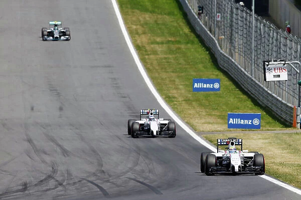 Red Bull Ring, Spielberg, Austria. Sunday 22 June 2014. Felipe Massa, Williams FW36 Mercedes, leads Valterri Bottas, Williams FW36 Mercedes, and Nico Rosberg