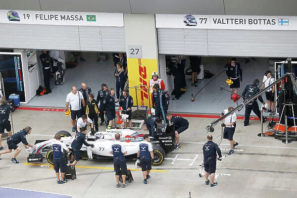 Red Bull Ring, Spielberg, Austria. Friday 20 June 2014. Valterri Bottas, Williams FW36 Mercedes, is returned to the garage. World Copyright: Steven Tee / LAT Photographic. ref: Digital Image _X0W1571