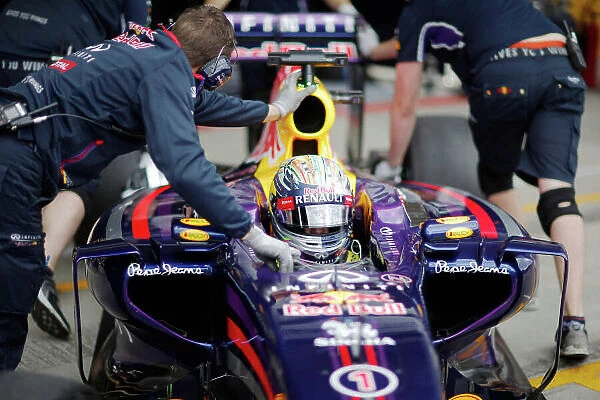 Red Bull Ring, Spielberg, Austria. Saturday 21 June 2014. Sebastian Vettel, Red Bull Racing RB10 Renault, is returned to the garage. World Copyright: Charles Coates / LAT Photographic. ref: Digital Image _N7T1852