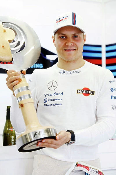 Red Bull Ring, Spielberg, Austria. Sunday 22 June 2014. Valterri Bottas, Williams F1, 3rd Position, with his trophy. World Copyright: Charles Coates / LAT Photographic. ref: Digital Image _N7T5146