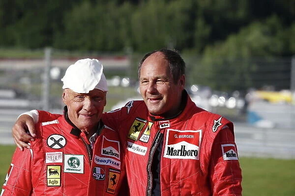 Red Bull Ring, Spielberg, Austria. Saturday 21 June 2014. Niki Lauda, Non-Executive Chairman, Mercedes AMG and Gerhard Berger. World Copyright: Charles Coates / LAT Photographic. ref: Digital Image _N7T3778