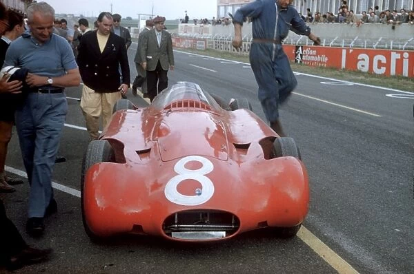 Reims, France. 29th June - 1st July: A Streamline Maserati 250F is prepared in the pits