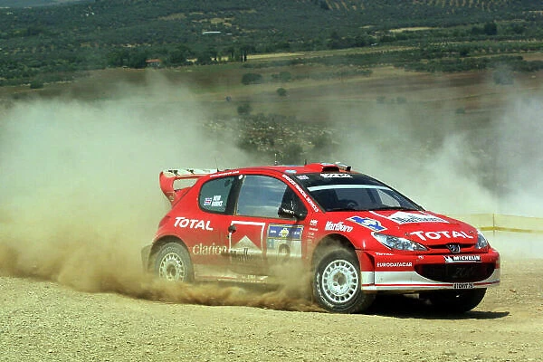 Richard Burns in action in the Peugeot 206 WRC, Acropolis Rally 2003. Photo: McKlein / LAT