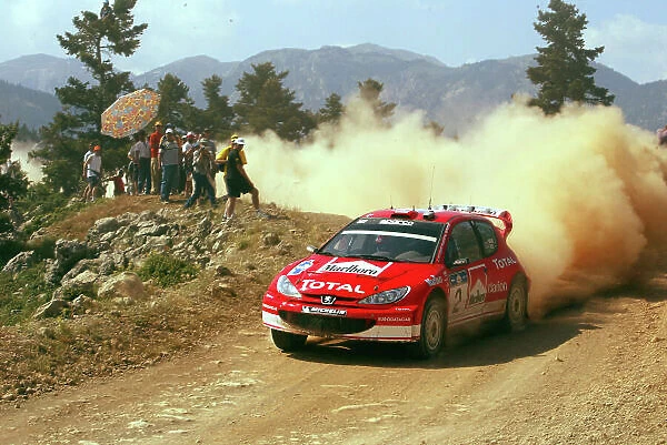 Richard Burns in action in the Peugeot 206 WRC, Acropolis Rally 2003. Photo: McKlein / LAT