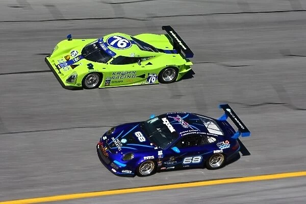 Rolex 24 at Daytona: Darren Turner Ford Lola passes Chris Pallis Porsche 911 GT3 Cup