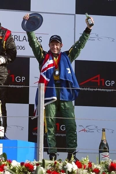A1GP. Ryan Briscoe (AUS) A1 Team Australia on the podium.