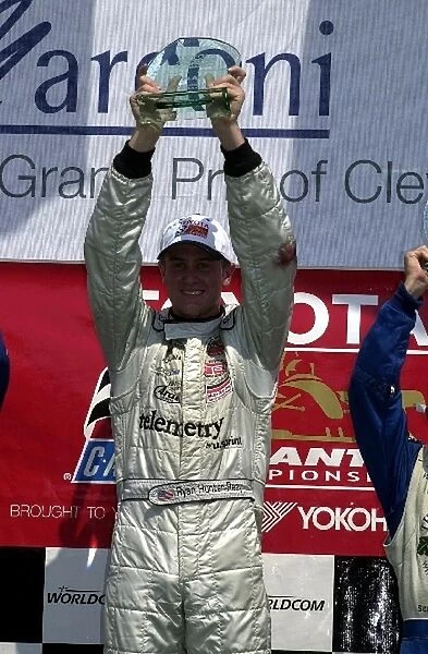 Ryan Hunter-Reay (USA) holds the winners trophy at the Toyota Atlantic race at the Marconi Grand Prix