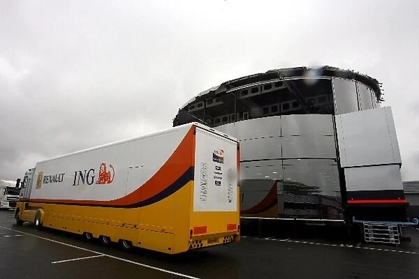Setting Up For The British Grand Prix: The new McLaren motorhome is constructed as the Renault team arrives at the circuit