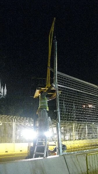 Singapore Circuit Construction: Debris fences are constructed at night